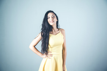 Fototapeta premium young woman in studio background