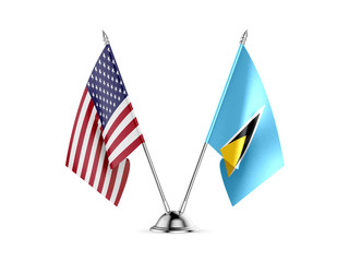 Desk flags, United States America and Saint Lucia, isolated on white background. 3d image