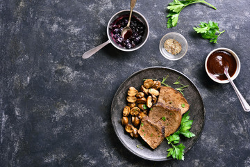 Slow cooked beef with mushrooms and blueberry sauce