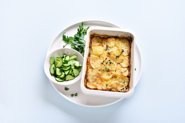 Potato gratin in baking dish