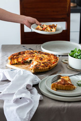 Rustic ratatouille tarte on a table served for 2 persons. 