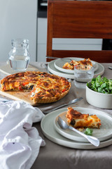 Rustic ratatouille tarte on a table served for 2 persons. 