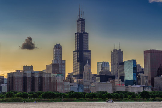 Chicago, Illinois / USA  08/18/2019: Dramatic Golden Sunset behind the City of Chicago Skyline.