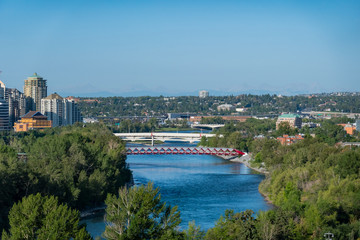 Fototapeta premium Morning aerial view of the famous red Peace Bridge and downtown cityscape