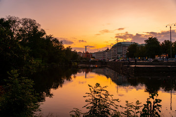 Fototapeta premium sunset in Goteborg Sweden with the reflection on the river