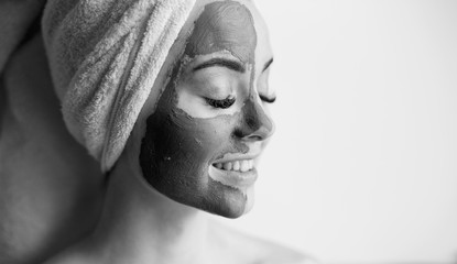Portrait of beautiful woman with healthy glow perfect smooth skin. Model with natural nude make up,...