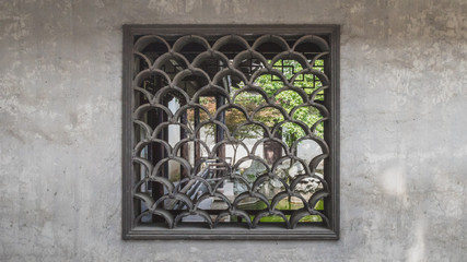 Window with garden view in old town of Nanxun, Zhejiang, China