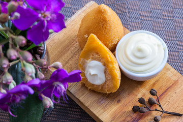 Brasilian snack coxinha, dried meat with cheddar