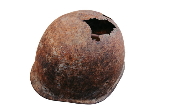 An old, rusty, battered military helmet.