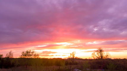 Nebraska countryside landscape trees, water, and sky with clouds