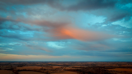 Nebraska countryside landscape trees, water, and sky with clouds