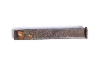   Old rusty stainless steel crescent chisel isolated on white top view
