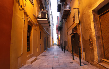Fototapeta na wymiar Narrow pedestrian street in the city of Bastia, Corsica, France