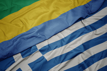 waving colorful flag of greece and national flag of gabon.