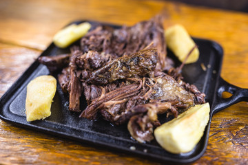 Pork rib meat on plate with potatoes. Typical food of Minas Gerais, Brazil.