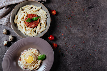Italian style pasta dinner. Spaghetti with tomato and basil in plate , top view