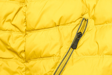 zipper of a yellow jacket