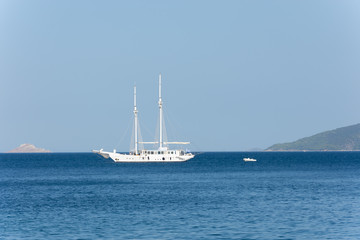 Fototapeta premium Beautiful seascape. Sailing yacht in the blue sea.
