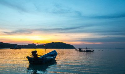 Fishermen boat at sunset near Koh Phangan island, Thailand