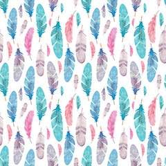 Seamless pattern with isolated watercolor feathers. Hand painted colorful feathers.