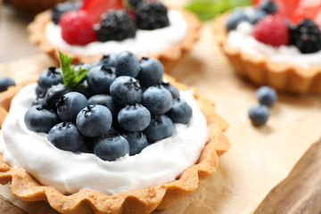 Tart with blueberries, closeup view. Delicious pastries