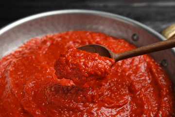 Delicious tomato sauce in pan, closeup view