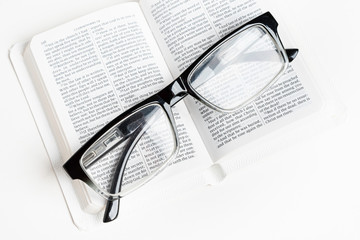 White Pocket Bible With Reading Glasses