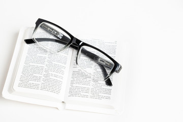 White Pocket Bible With Reading Glasses