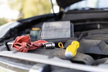 minor automotive issues that may come up from flat tire, dirty air filter, or low oil.  