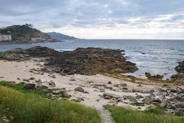 Fototapeta na wymiar View of the beach of os frades in Baiona (Pontevedra)