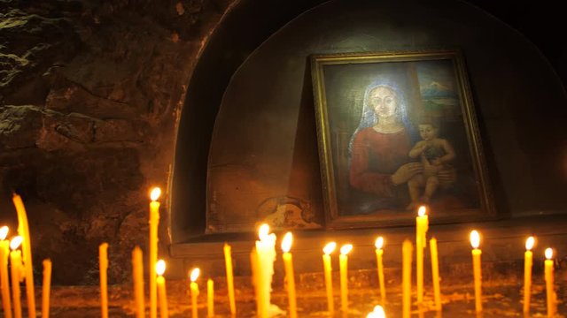 Candles and Picture of Mary and Jesus in an Ancient and Authentic Christian Monastery, Armenia 3