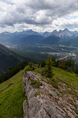 Beautiful View of Canadian Rocky Mountain Landscape during a cloudy and rainy day. Taken from Mt Lady MacDonald, Canmore, Alberta, Canada.