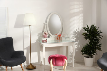 Stylish room interior with elegant dressing table