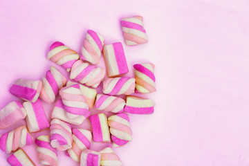 Pink sweetness, marshmallow pattern. Vanilla tenderness. Sweet food background. Gift card. Top view.