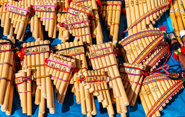  Traditional Andes pan flutes or panpipes on a market stall in Cusco, Peru. It is a traditional music instrument that can be found in Peru, Ecuador and Bolivia. © SL-Photography