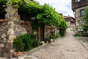 Fototapeta na wymiar Narrow streets of an ancient seaside town of Sozopol on the southern Bulgarian Black Sea Coast.