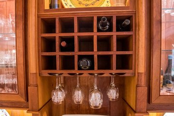 In Home Stained wood Butler's pantry wine bottle refrigerator and glasses storage. Includes wine...