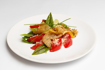 squid with a vegetables on a plate