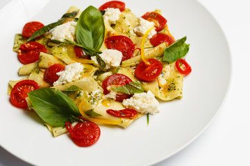 Italian pasta with a pesto sauce