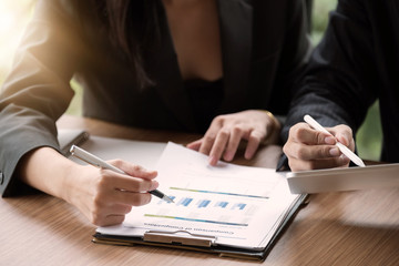 Close up Group of business people busy discussing financial matter during meeting. Corporate Organization Meeting Concept