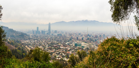 Panoramic view of Santiago's pollution with the Andes Mountains as background from San Cristobal...
