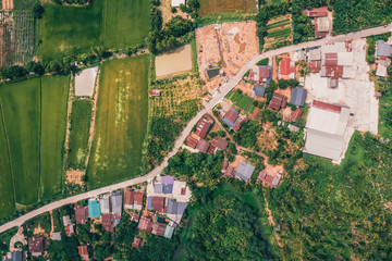 aerial view from drone of road and rural area with a fields