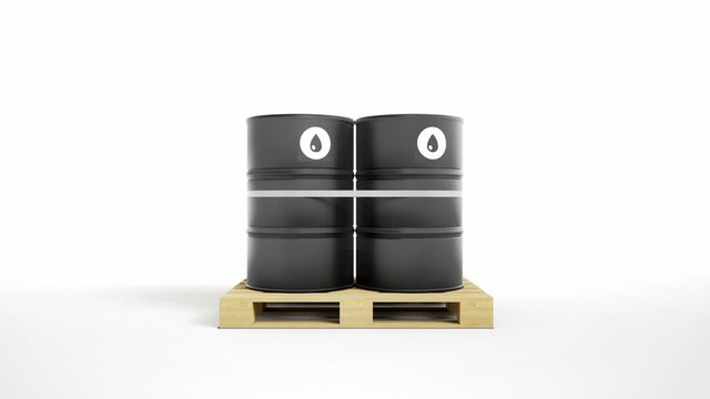 Two metal black barrels with oil symbol are strapped by tape, located on wooden pallet, isolated on white background. Camera dolly movement, zoom. 60 fps animation.