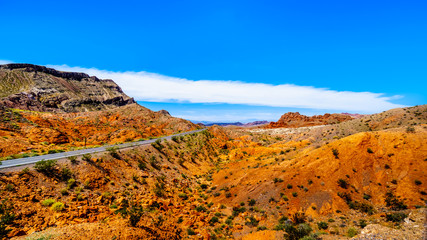 Northshore Road SR167 in Lake Mead National Recreation Area winding through semi desert landscape with colorful mountains between Boulder City and Overton in Nevada, USA