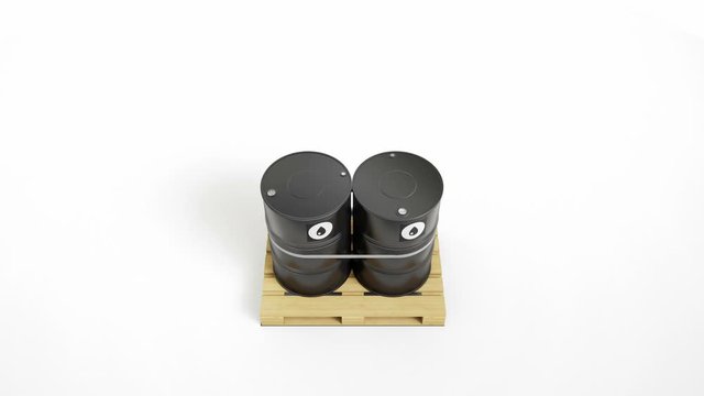 Top view of two metal black barrels with oil symbol located on wooden pallet isolated on white background. Barrels are strapped by tape, fillers on top. Camera zoom movement. 60 fps animation.