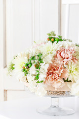 Summer floral arrangement with roses, dahlias and hortensias.