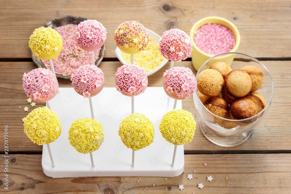 Canvas Prints pink and yellow cake pops.