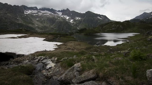 Timelapse from the mountain lake Seebodensee at Sustenpass in Switzerland