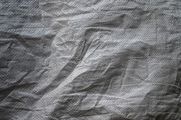 Dark grey canvas fabric texture.