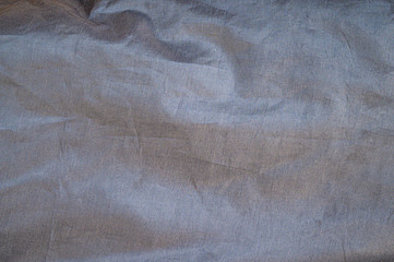 Dark grey canvas fabric texture.